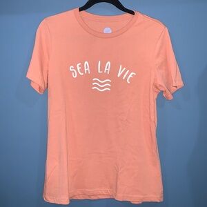 Beachly t-shirt.  Coral color